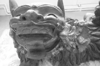 chinese-carved-ivory-sea-deity-on-a-foo-dog-photo-0