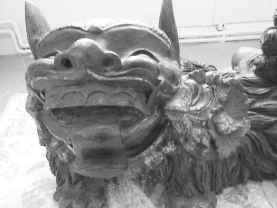 chinese-carved-ivory-sea-deity-on-a-foo-dog-photo-0